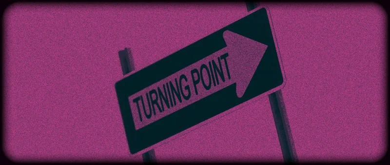A road sign reading TURNING POINT with an arrow, dark teal on grainy magenta