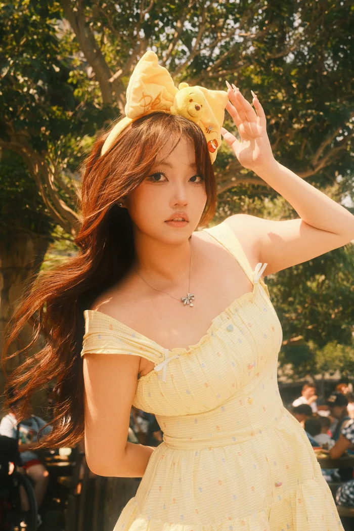 Disneyland shoot cover — portrait in dappled sunlight